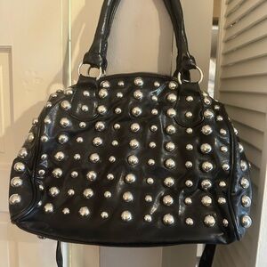 Designer inspired studded faux leather purse.